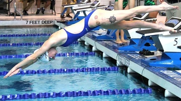 Lauren Ditchey diving into the pool