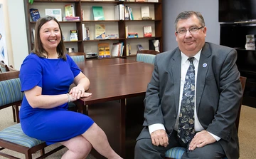 Internship Coordinator Jennifer and Office of Engagement and Career Development Interim Director Chris LaGrow, in the Career Development Office in Gregory Hall.