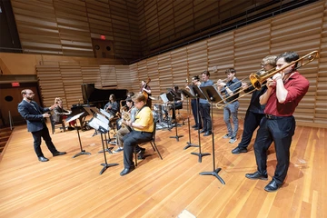 students performing on stage