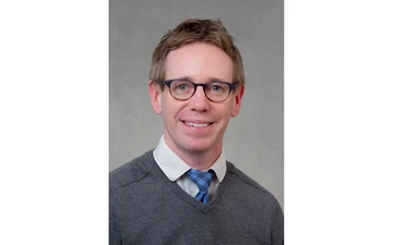 Dr. Justin Conroy head shot