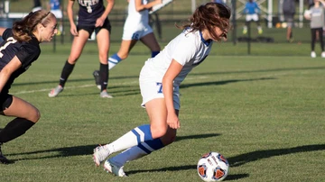 Katie Sellers plays soccer
