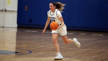 Mary Culeton playing basketball