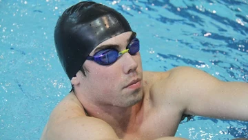 Patrick McCrone in pool, men's swimming and diving