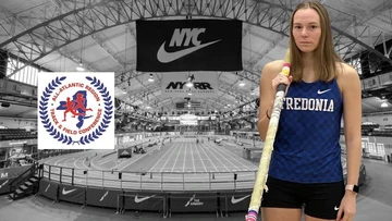 Pellechia with pole for vaulting in front of track