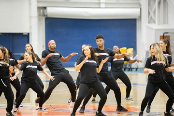 students dance at pep rally