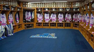 locker room with Pink the Rink jerseys
