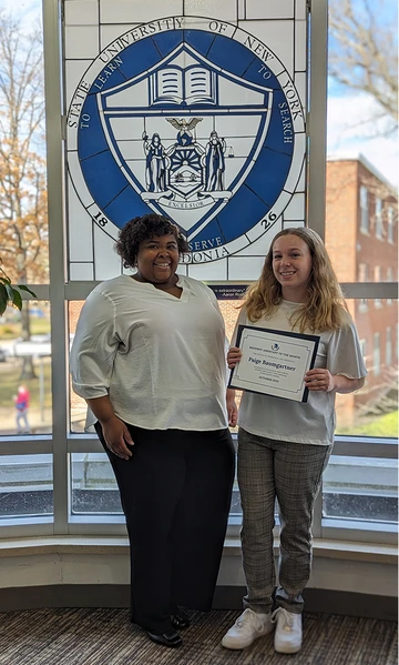 Paige Baumgartner and Nixon Hall Residence Director Heather Williams.