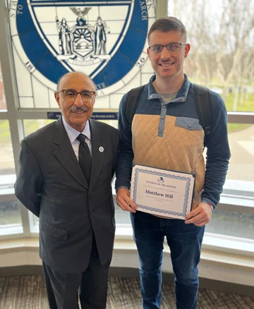 Matthew Hill with Dr. Moj Seyedian, Accounting major, Public Accounting major, Business major