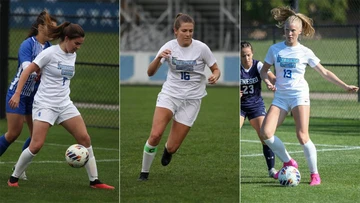 Katie Sellers, Jordan Barrett and Gabby Irwin playing soccer