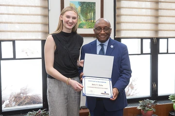Julia T. Skiba, recipient of the 2026 Lanford Presidential Prize, with President Stephen H. Kolison Jr.