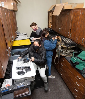 students with donated sound equipment