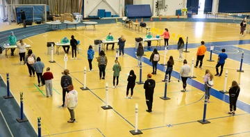 students, faculty and staff waiting for testing in Steele Hall