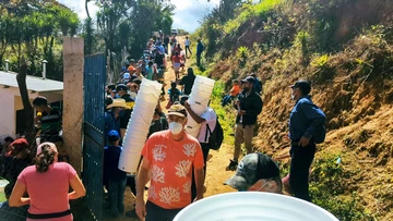 Ted Lee in Honduras water station