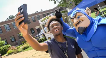 Student with Freddy mascot