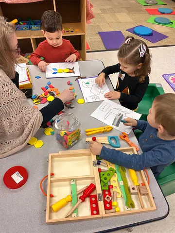 Children engage in a multisensory learning fun activity at the Youngerman Center Preschool.