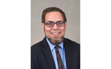 head shot of Dr. Junaid Zubairi