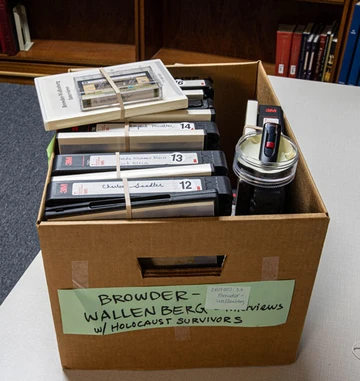 box of videotapes, Reed Library Archives and Special Collections, Holocaust