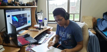 student working at a computer