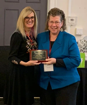 Dean Christine Givner receives award