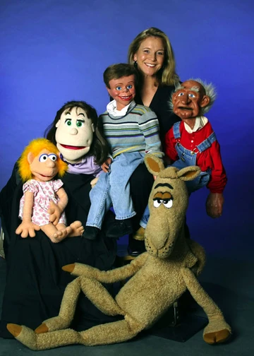 Ventriloquist/comedienne Lynn Trefzger and her trunk full of zany characters.