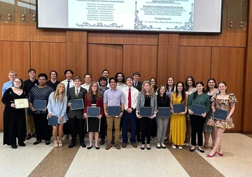 group of award recipients from a previous ceremony