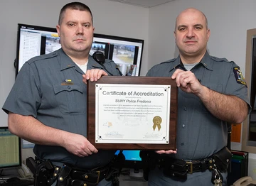 Brian Studley (left) and Benjamin Miller, who both hold the rank of lieutenant in the University Police Department at Fredonia, 