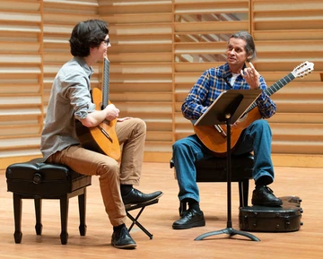 William Jenney with Luis Zea at a master class.