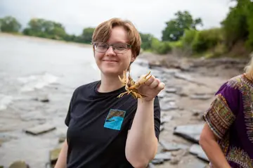 STEM students in geology and environmental sciences on the shore of lake erie
