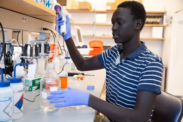 Mam Deng in the laboratory in Fredonia’s Science Center.