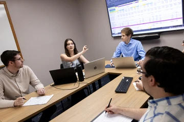 Fredonia students in a business class having a discussion