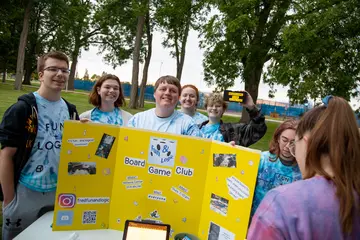 Students have opportunities to join or form clubs across campus, like the Chess Club seen here on activities night 