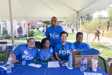 Fredonia EOP students enjoy tabling at an event