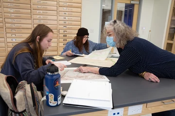 Geoscience students in the lab with instructor