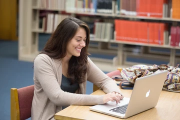 student with laptop. Fredonia social work degree students are mentored by seasoned faculty.  