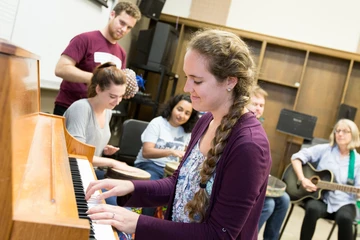 School of Music music therapy students in class sharing music together