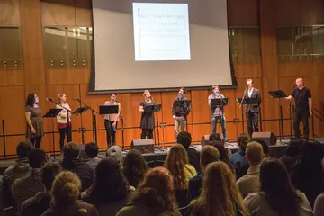 Students performing at a concert on campus 