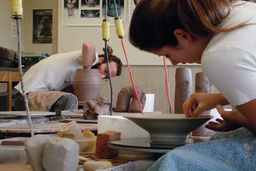 students work in the ceramics studio