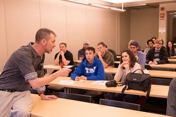 Fredonia alum and writer Sean Kirst addresses students during a Writers at Work workshop