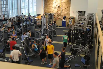 students work out and exercise in the fitness center