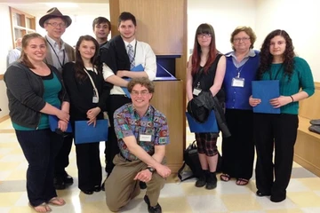 math students pose for a picture at a conference