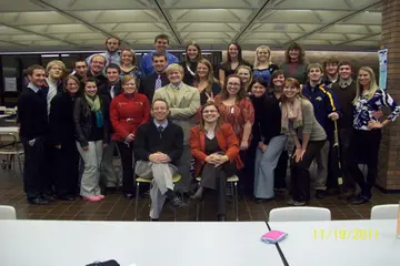 a group poses for a photo at familiy math night