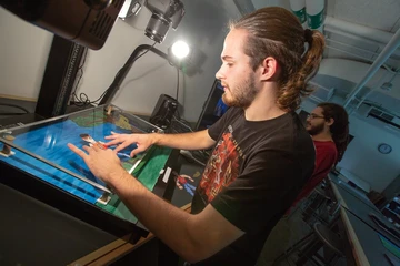 Fredonia students working on stop-motion animation in the lab