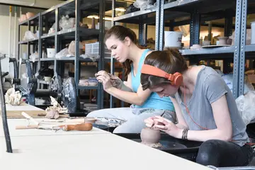 Students working with clay in the studio toward their ceramics degree, or degree in ceramics, ceramics major  Ceramics in New York | Ceramics degree | Degree in ceramics | ceramics in New York