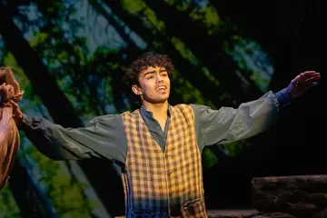 Fredonia student on stage in a production of Into the Woods, major in acting, acting program, acting major, acting degree