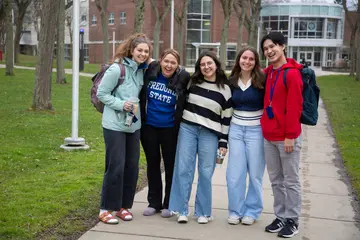 Fredonia students enjoying a walk across campus. International studies major, major in international studies,  international relations major, degree in international studies. 