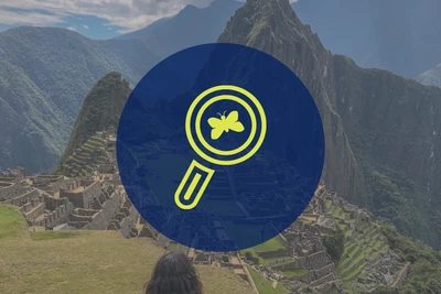 Student overlooking a beautiful vista and an icon of a magnifying glass