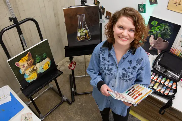 Fredonia students, like this art student, can get the aid they need 