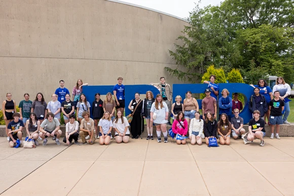 Fredonia students in front of the FRED letters