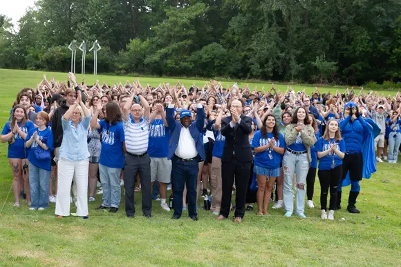 Students and campus leaders forming the giant F on campus at the start of the semester