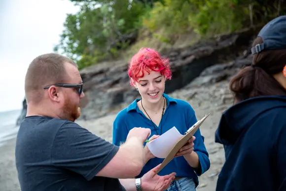 A Fredonia student in Geology has class on the shores of Lake Erie